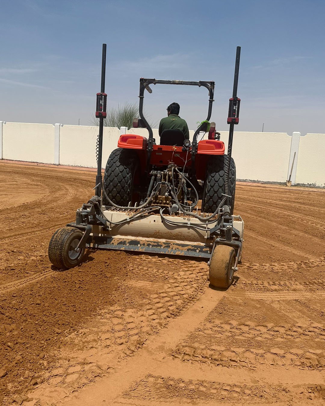 dtc-staffs-are-shaping-up-the-pitch-1
