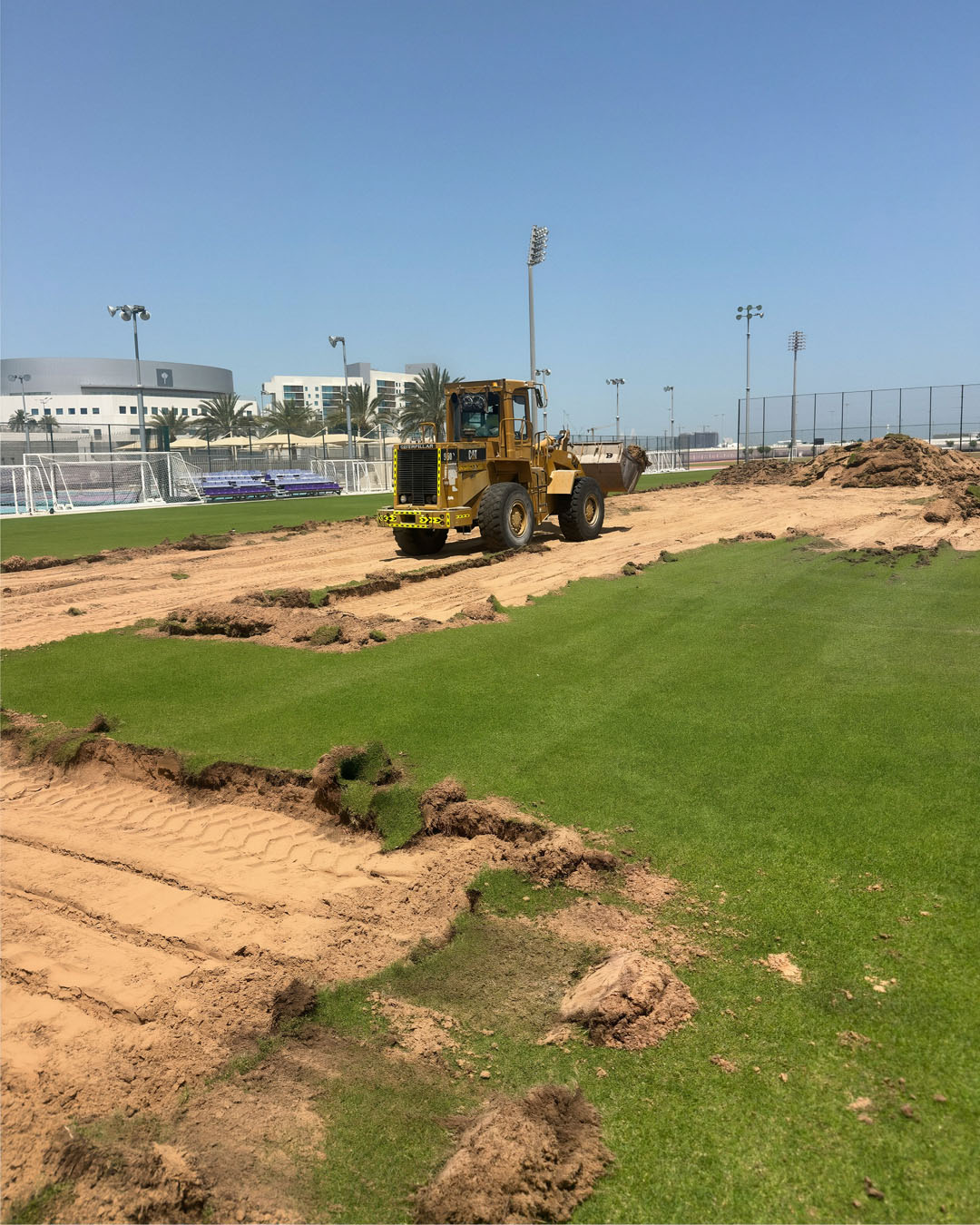 dtc-staffs-are-shaping-up-the-pitch-8